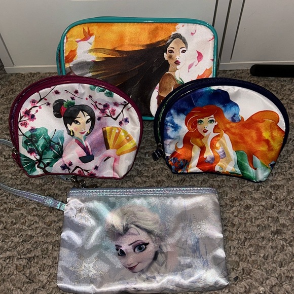 Disney Handbags - Lot of Disney Cosmetic Bags